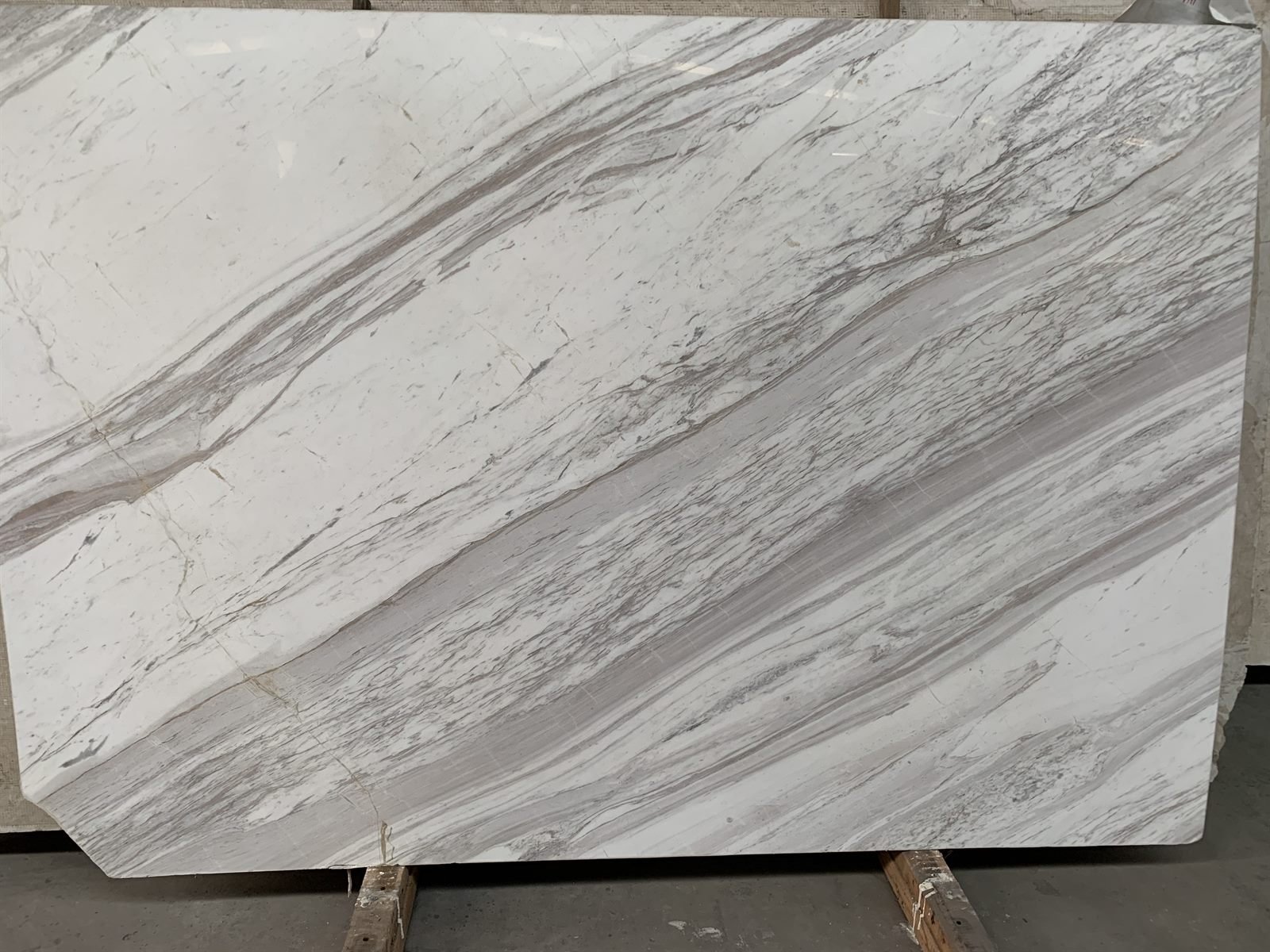 Volakas marble slab with cloud-like veining